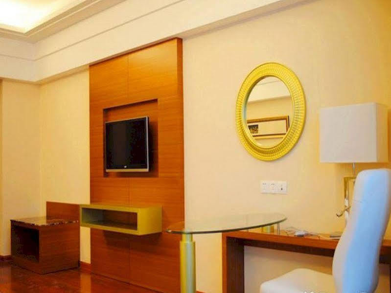Wenhua Herton Hotel Qionghai Exterior photo